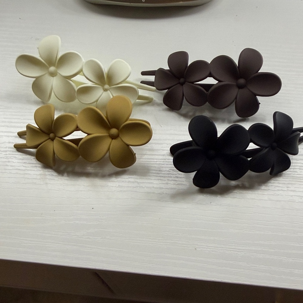 New without tags never worn neutral color floral hair clips